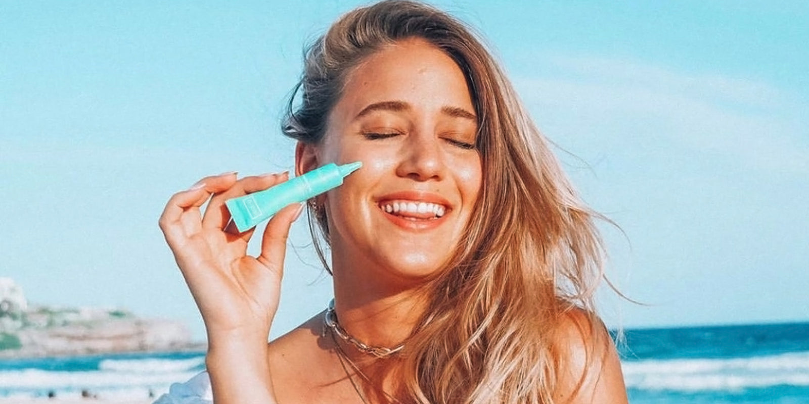 Happy girl with Acne using skincare treatment